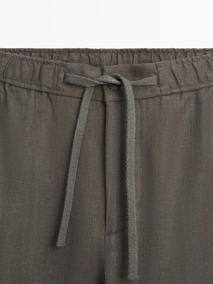 Льняные брюки в стиле джоггер- Заказать в России