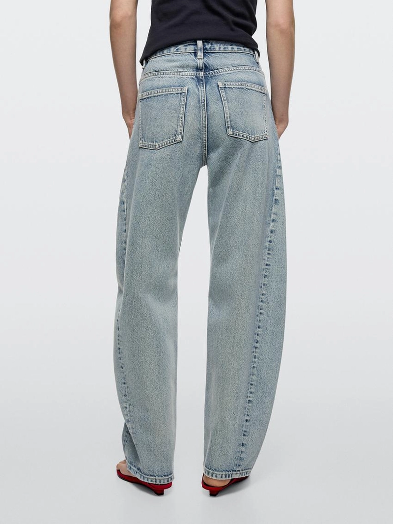 Джинсы с завышенной талией и объемным кроем