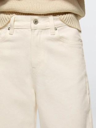 Джинсы с завышенной талией и широкими укороченными брючинами- Заказать в России