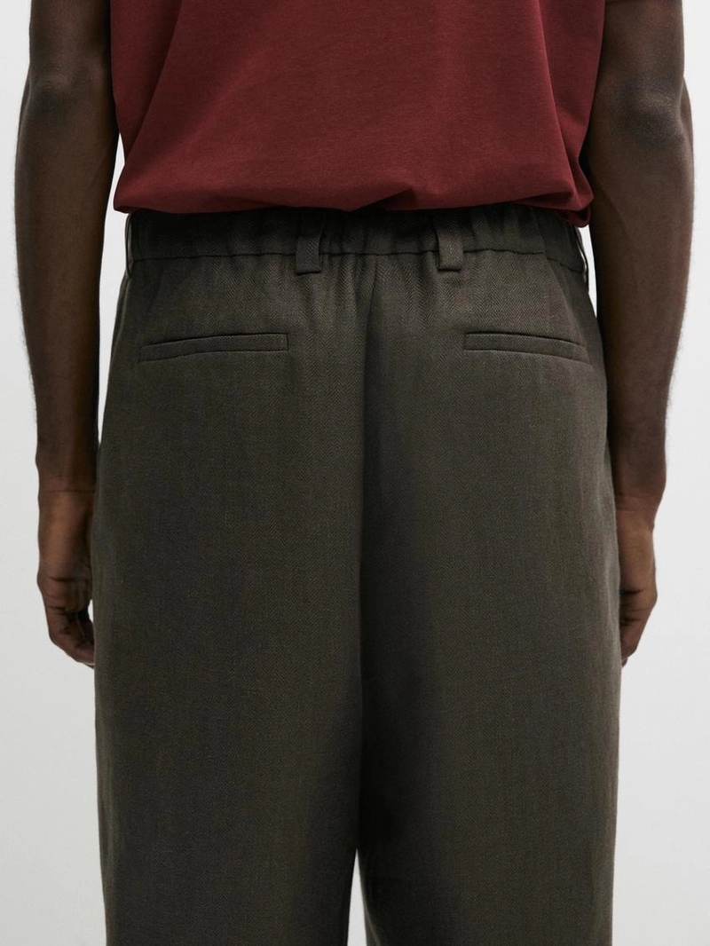 Льняные брюки с деталями из рыбьего кости