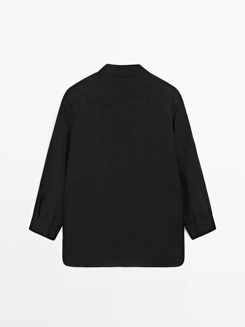 Рубашка из тонкой полупрозрачной ткани с деталями на груди