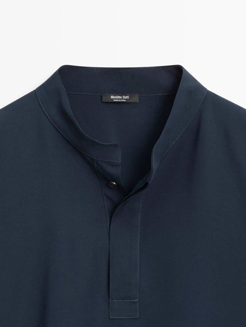 Блуза-пончо с воротником-стойкой