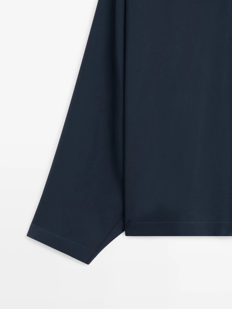 Блуза-пончо с воротником-стойкой