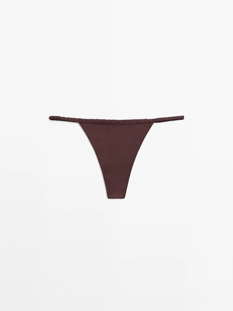 Шелковая стринги с кружевными деталями