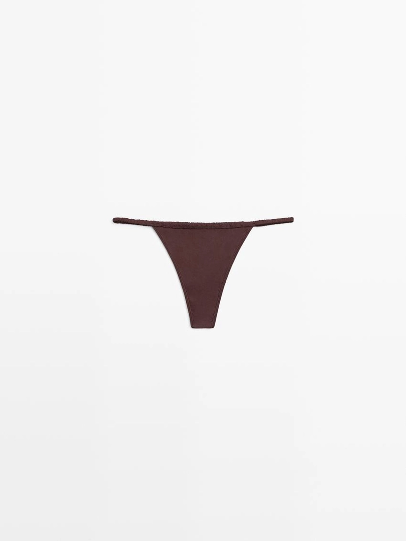 Шелковая стринги с кружевными деталями