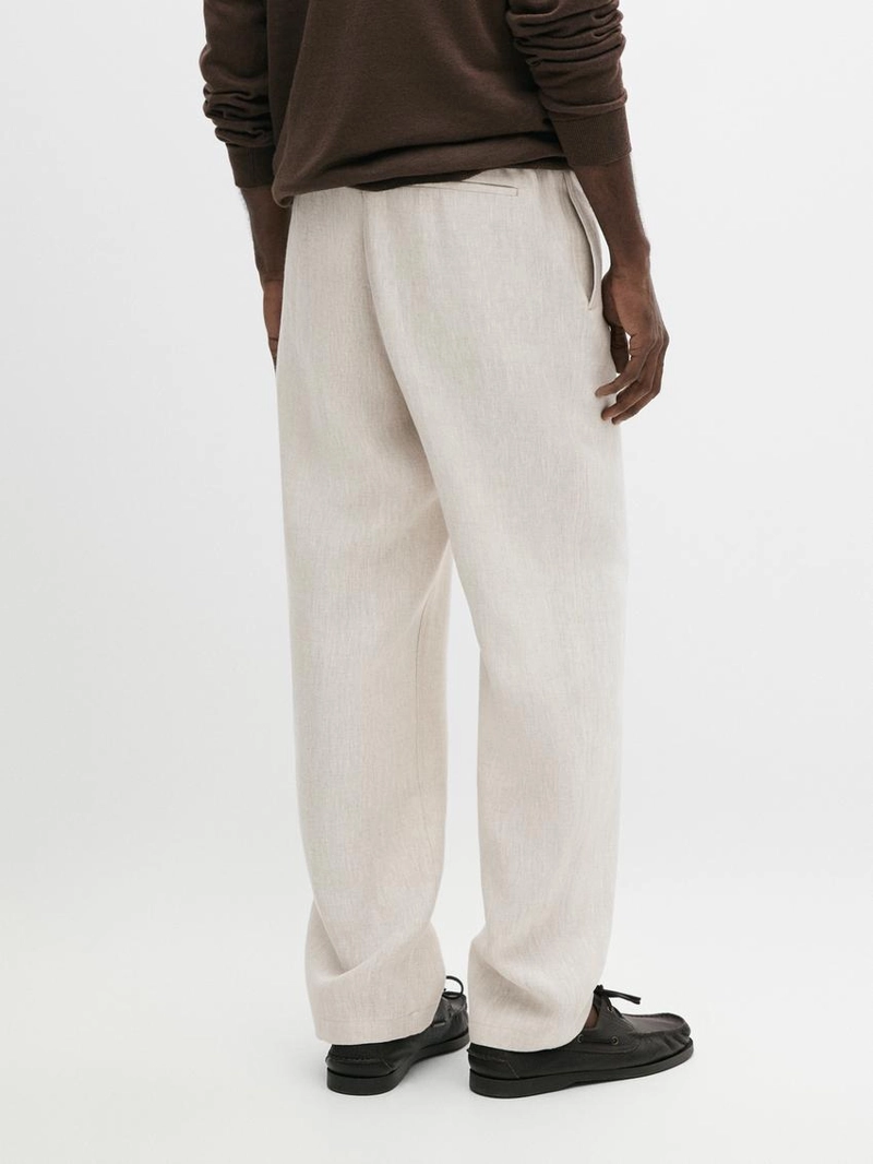 Льняные брюки в стиле джоггер