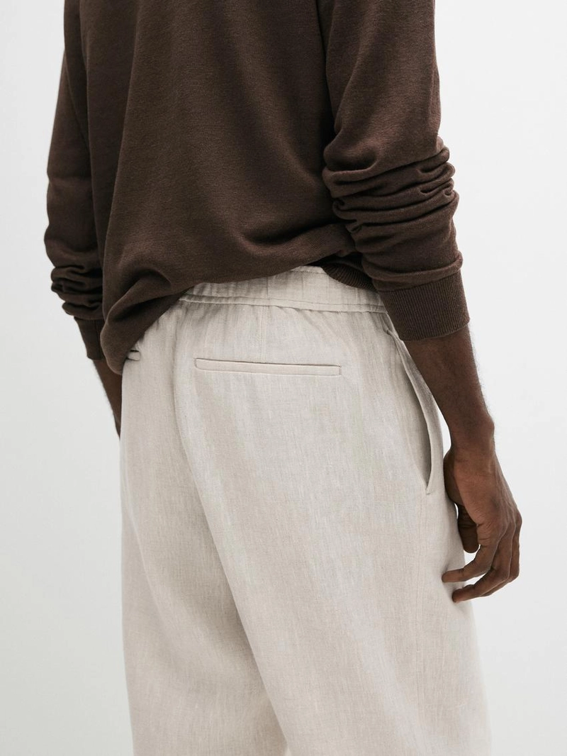 Льняные брюки в стиле джоггер