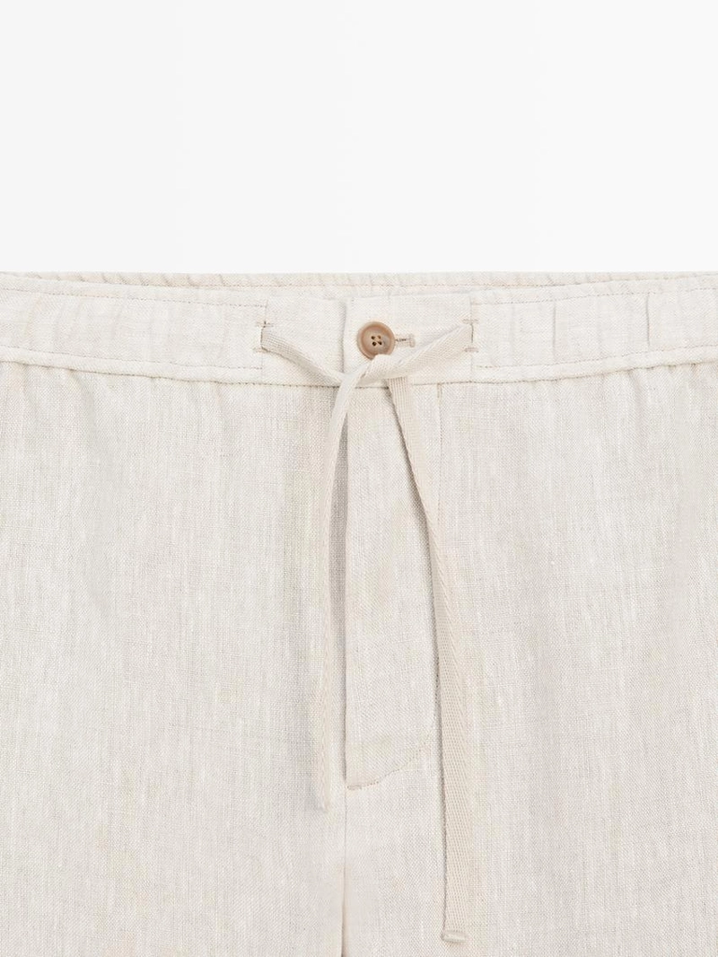 Льняные брюки в стиле джоггер