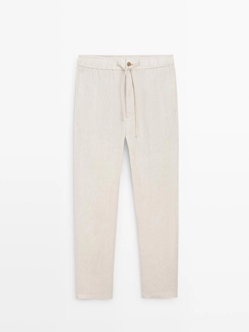 Льняные брюки в стиле джоггер