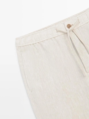 Льняные брюки в стиле джоггер- Заказать в России