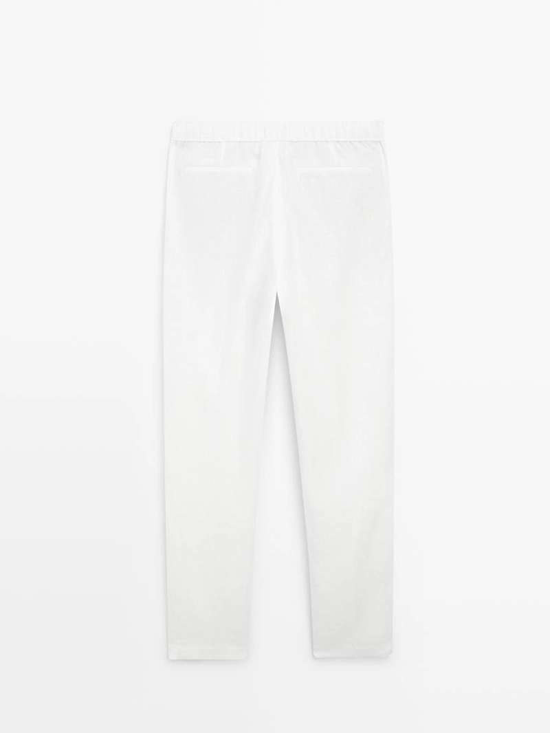 Льняные брюки в стиле джоггер