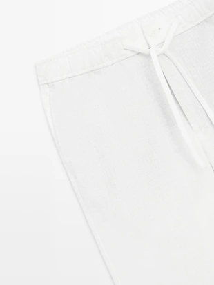 Льняные брюки в стиле джоггер- Заказать в России