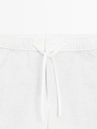 Льняные брюки в стиле джоггер- Заказать в России