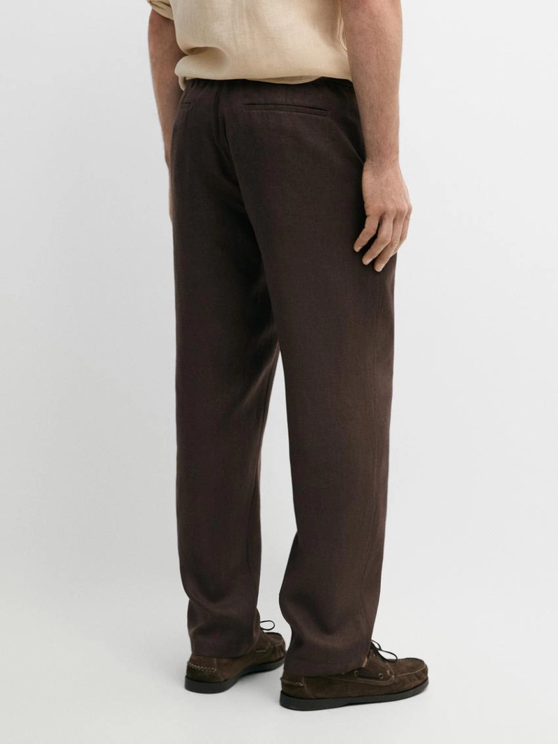 Льняные брюки с посадкой джоггер