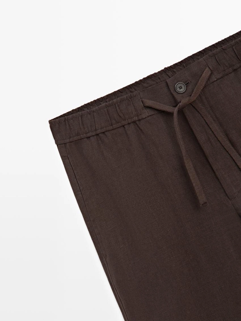 Льняные брюки с посадкой джоггер