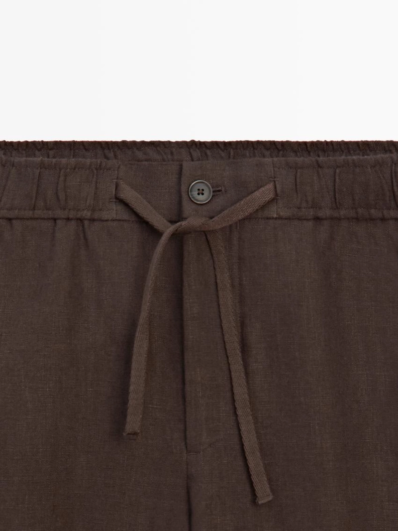 Льняные брюки с посадкой джоггер