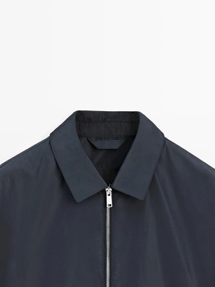 Куртка из технической ткани с коротким рукавом- Заказать в России