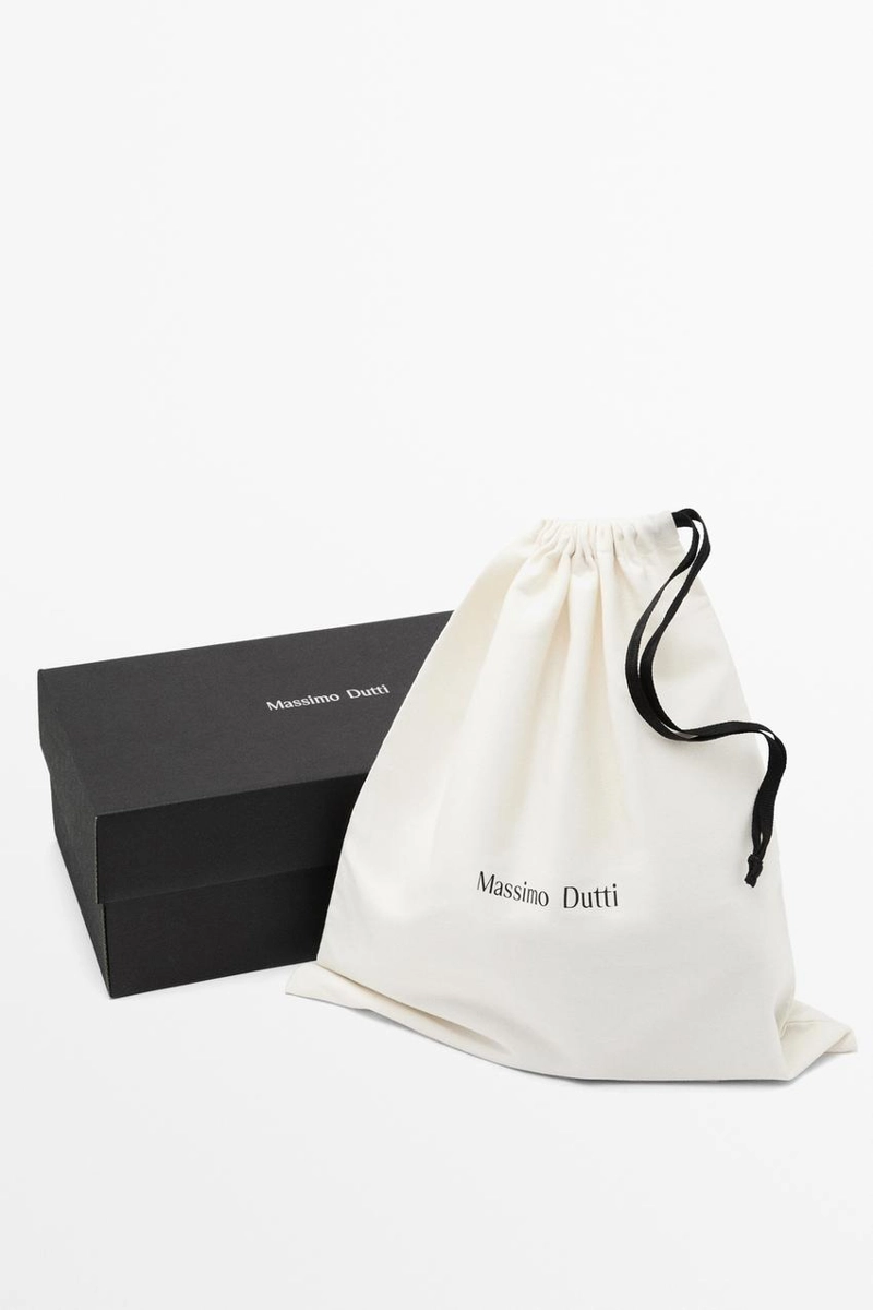 Босоножки на каблуке с узлом