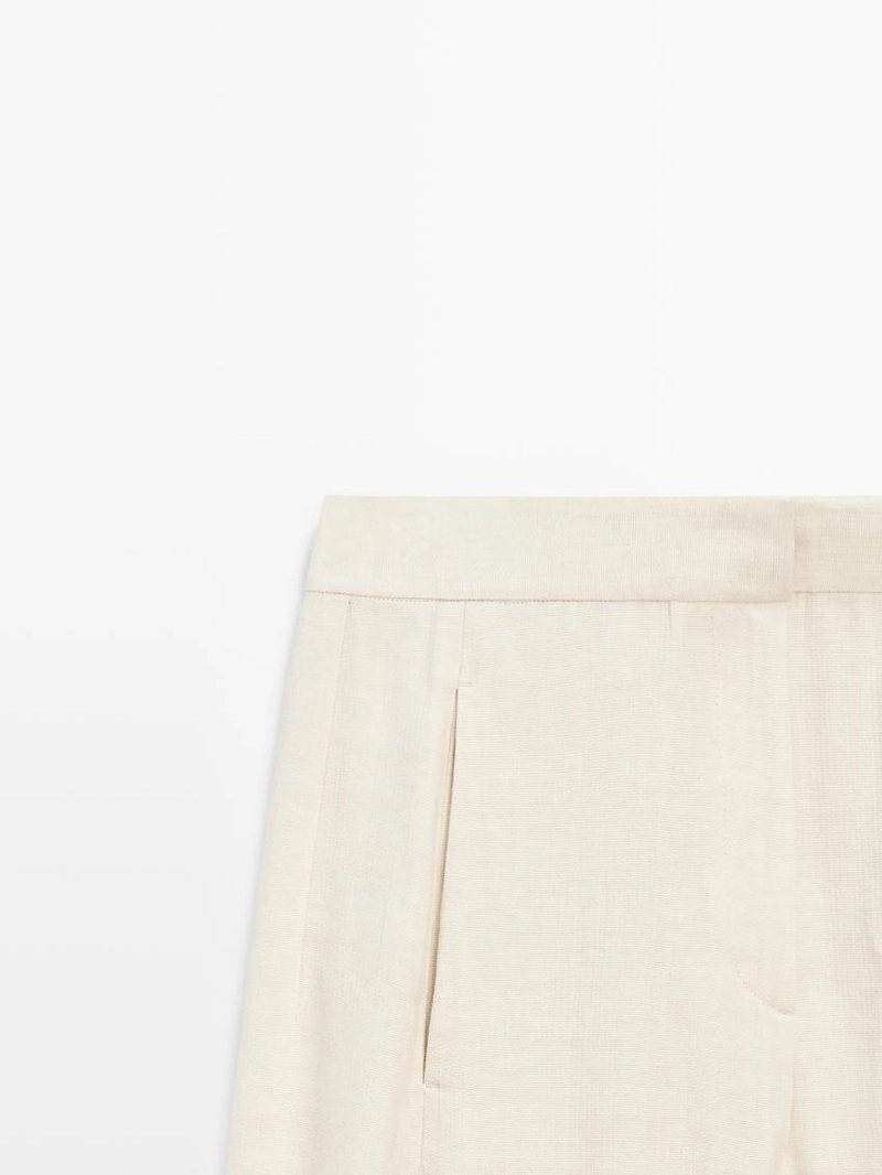 Брюки-костюм из льняной смеси с деталями на пуговицах