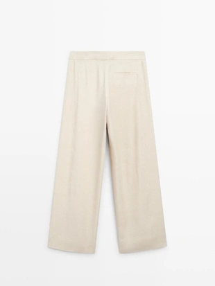 Брюки-костюм из льняной смеси с деталями на пуговицах- Заказать в России