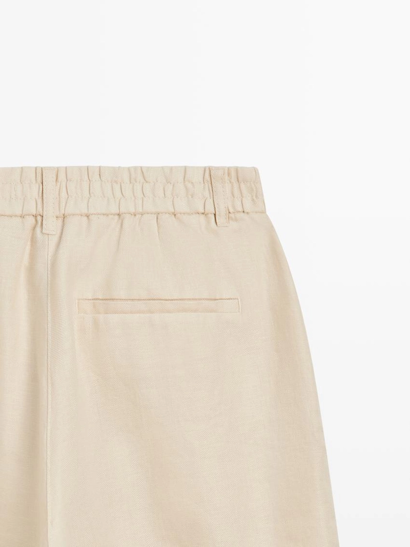 Брюки из 100% льна с широкими штанинами и эластичными деталями