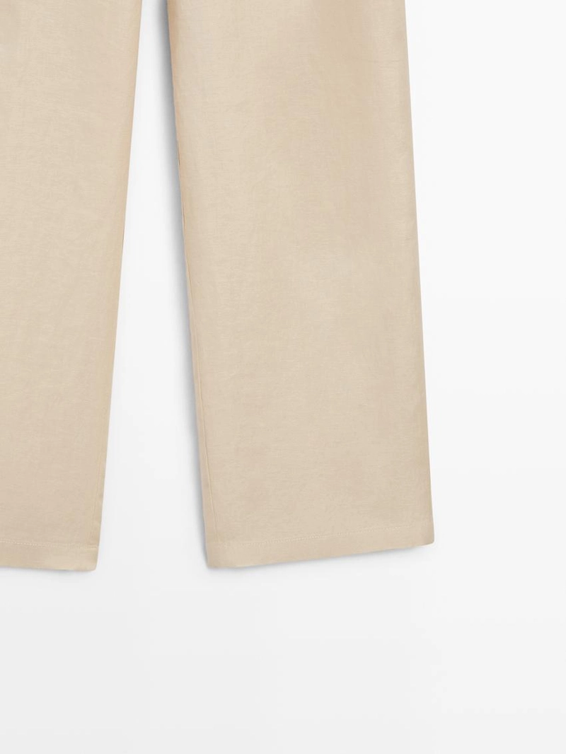 Брюки из 100% льна с широкими штанинами и эластичными деталями