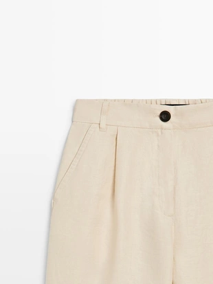 Брюки из 100% льна с широкими штанинами и эластичными деталями- Заказать в России