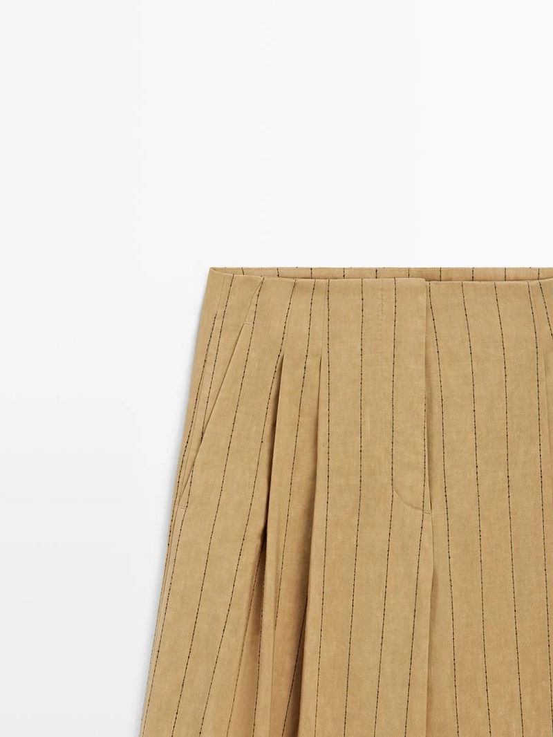 Широкие брюки с вытачками