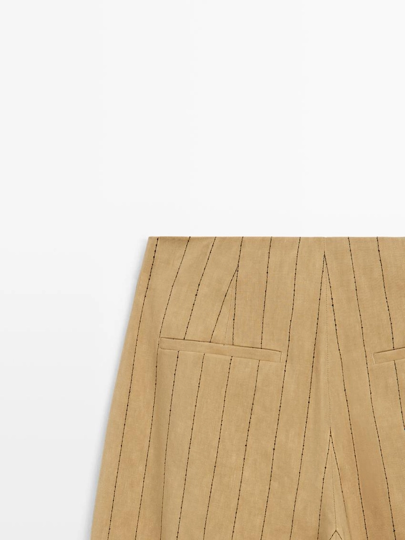 Широкие брюки с вытачками