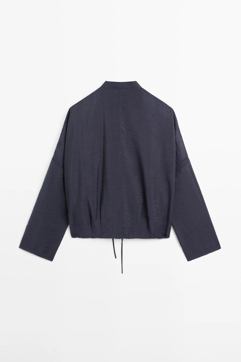 Куртка-бомбер с отложным воротником и деталями на пуговицах