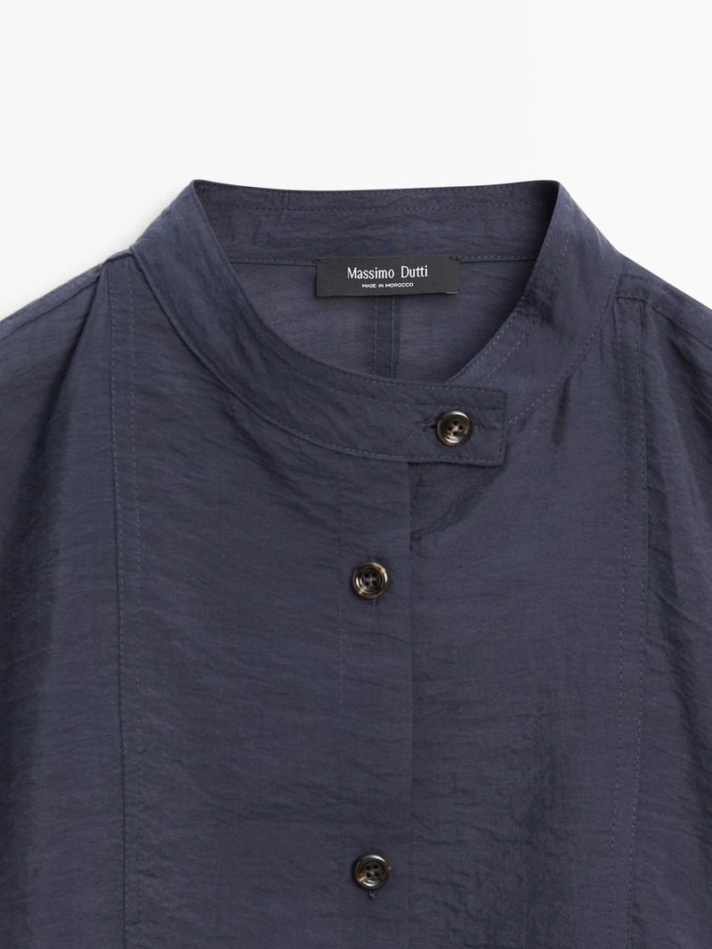 Куртка-бомбер с отложным воротником и деталями на пуговицах