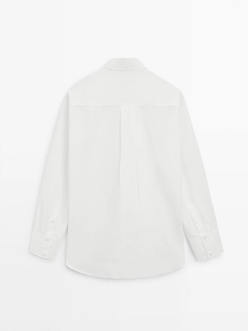 Рубашка с застежкой на пуговицы и аппликацией