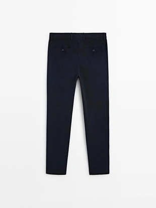 Брюки с узором из микротекстуры в зауженном крое- Заказать в России