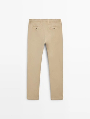 Брюки slim-fit с микротекстурой- Заказать в России