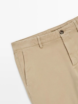 Брюки slim-fit с микротекстурой- Заказать в России