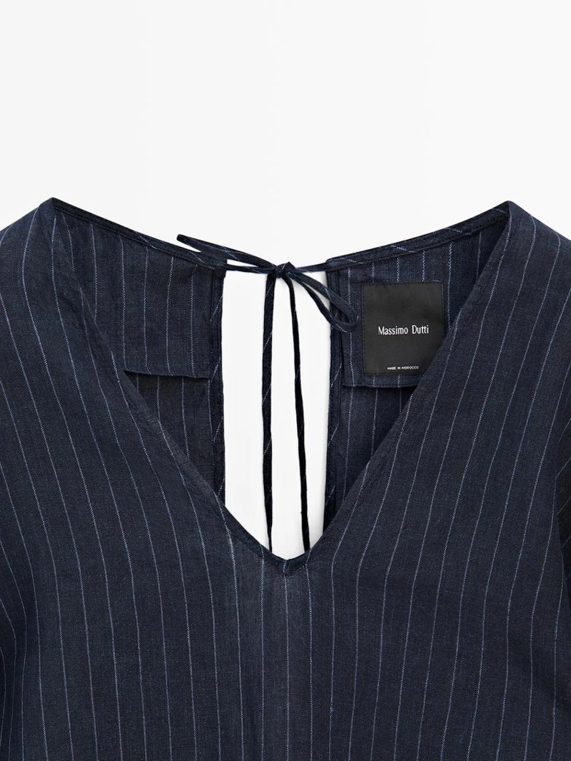 Рубашка из льна в полоску с деталями на спине