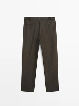 Брюки из льна с зауженным кроем- Заказать в России