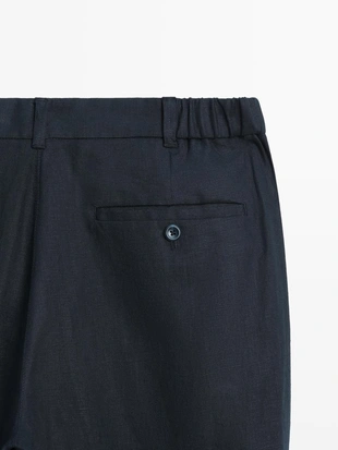 Брюки из льна с зауженным кроем- Заказать в России