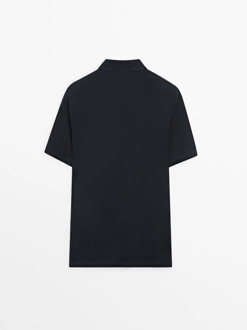 Поло с коротким рукавом и деталями на молнии