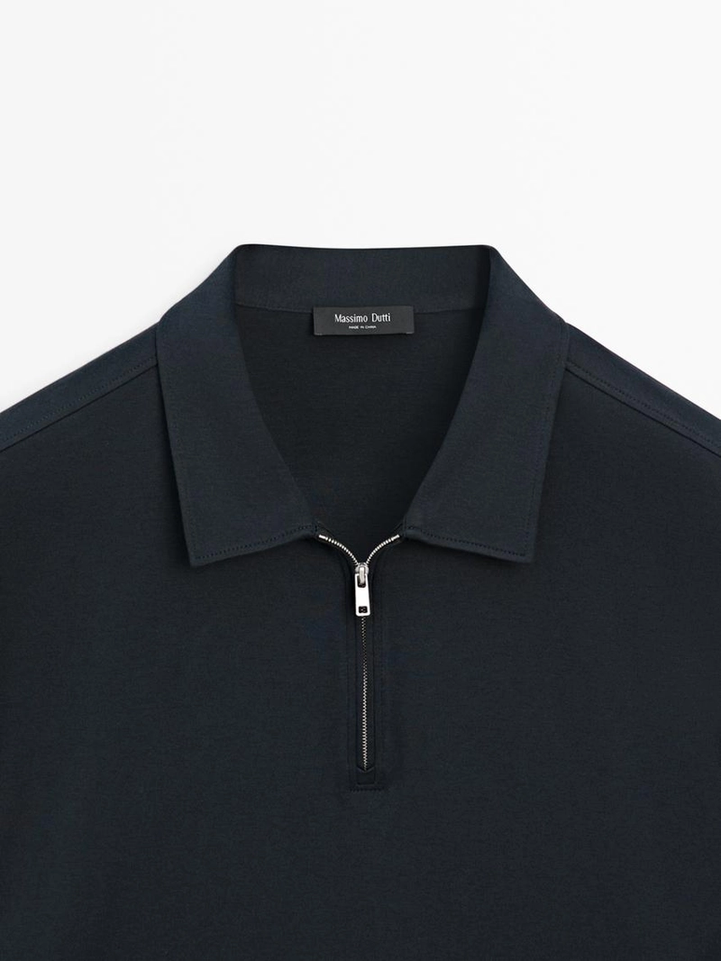 Поло с коротким рукавом и деталями на молнии