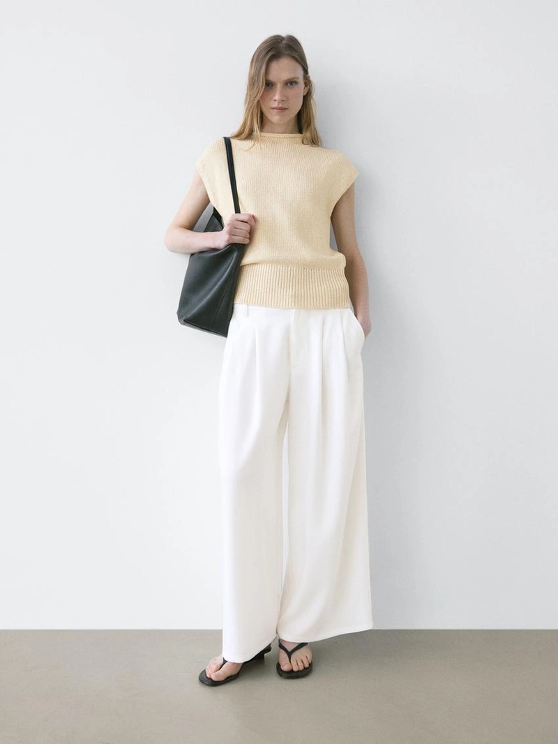 Широкие брюки с защипами