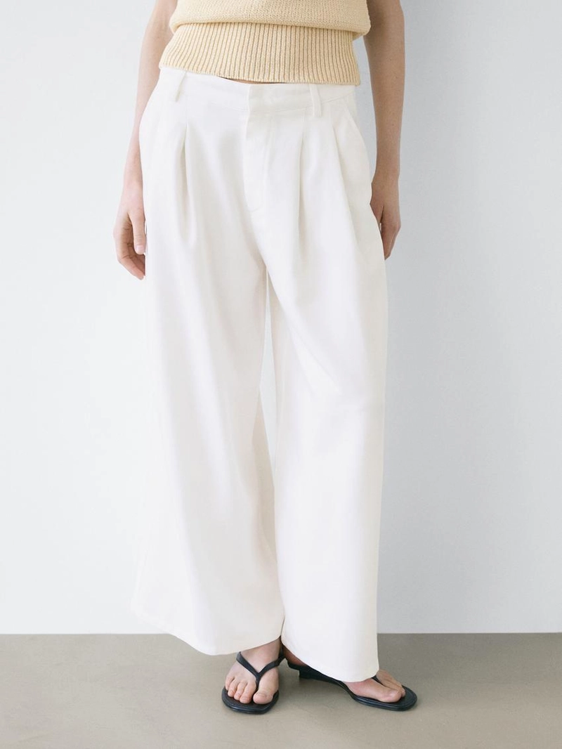 Широкие брюки с защипами