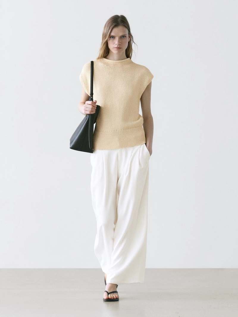 Широкие брюки с защипами