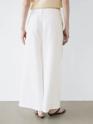 Широкие брюки с защипами- Заказать в России