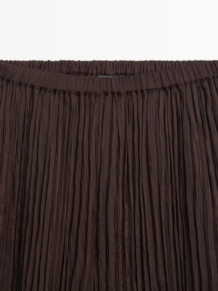 Брюки саруэль с деталями в складку- Заказать в России