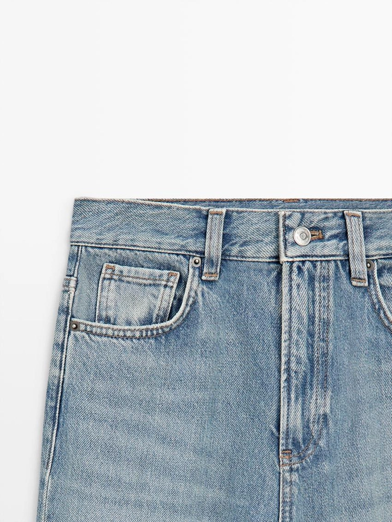 Джинсы с высокой посадкой и широкими штанинами