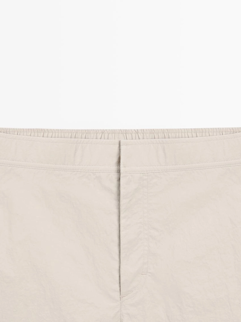 Купальные трусы с деталями на поясе