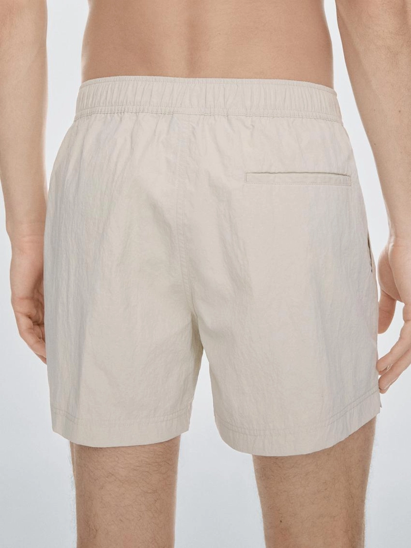 Купальные трусы с деталями на поясе