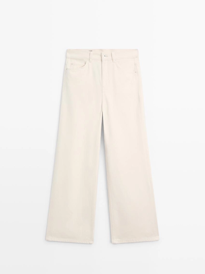 Джинсы с высокой посадкой и широкими брючинами