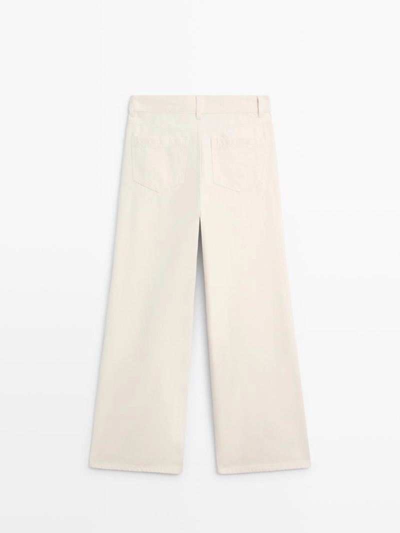 Джинсы с высокой посадкой и широкими брючинами